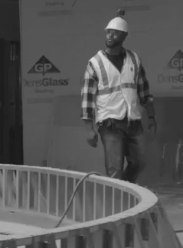 construction worker walking on site