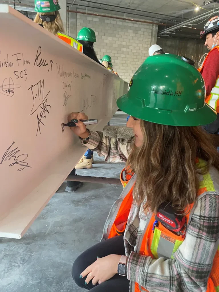 rhonda-el-hachache Signing-Topping-Out-Beam
