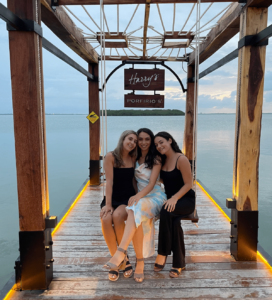 Sarah Ortiz and her friends on a dock