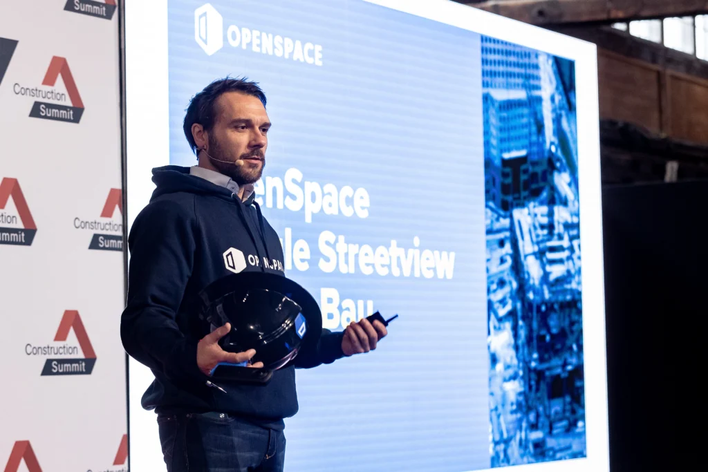 Marcel Martin form OpenSpace on Stage at Construction Summit 2023