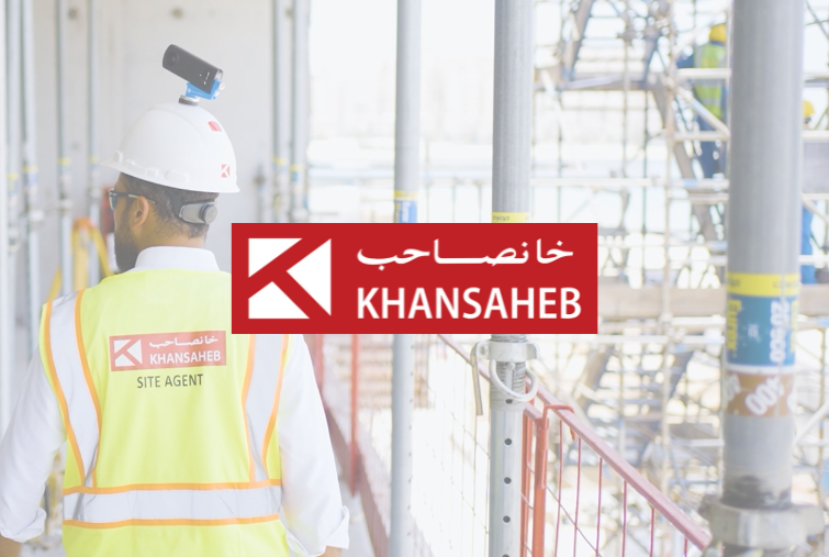 Site Agent on construction site with Khansaheb west, safety helmet and 360° camera